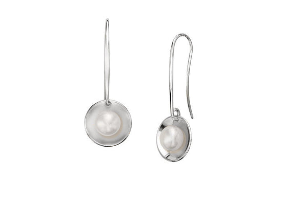 Photo of "Sun Glow" Pearl Earrings in a decorative scene, designed by , available at Plumb Gold & Plumb Silver