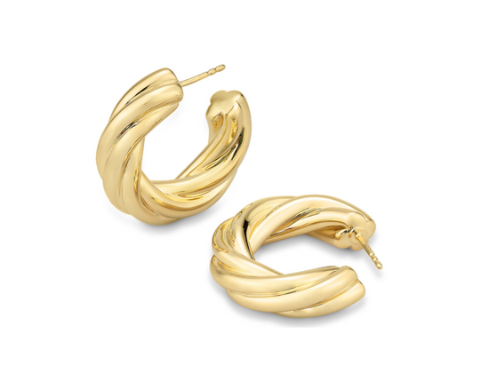 Photo of Thick Twisted Hoop in a decorative scene, designed by , available at Plumb Gold & Plumb Silver