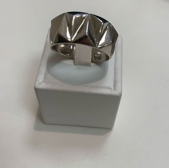 Photo of Ti Sento Geometric Ring in a decorative scene, designed by , available at Plumb Gold & Plumb Silver