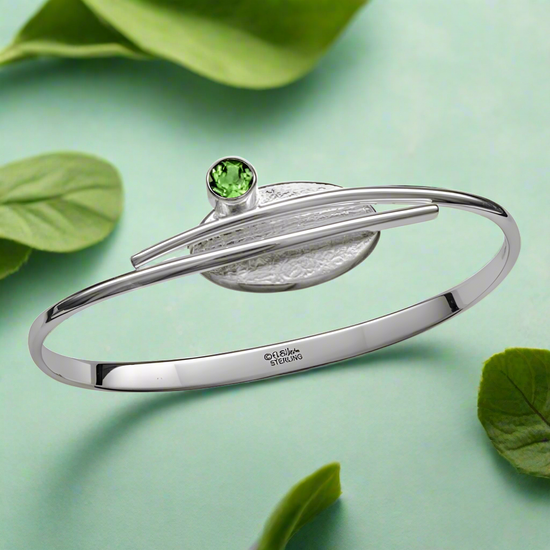 Photo of "Trill" Bracelet in a decorative scene, designed by , available at Plumb Gold & Plumb Silver