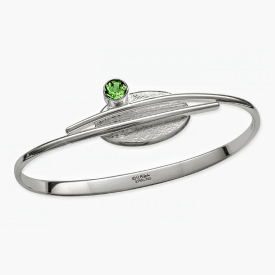 Photo of "Trill" Bracelet in a decorative scene, designed by , available at Plumb Gold & Plumb Silver