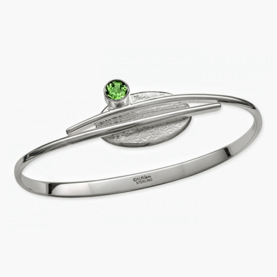 Photo of "Trill" Bracelet in a decorative scene, designed by , available at Plumb Gold & Plumb Silver