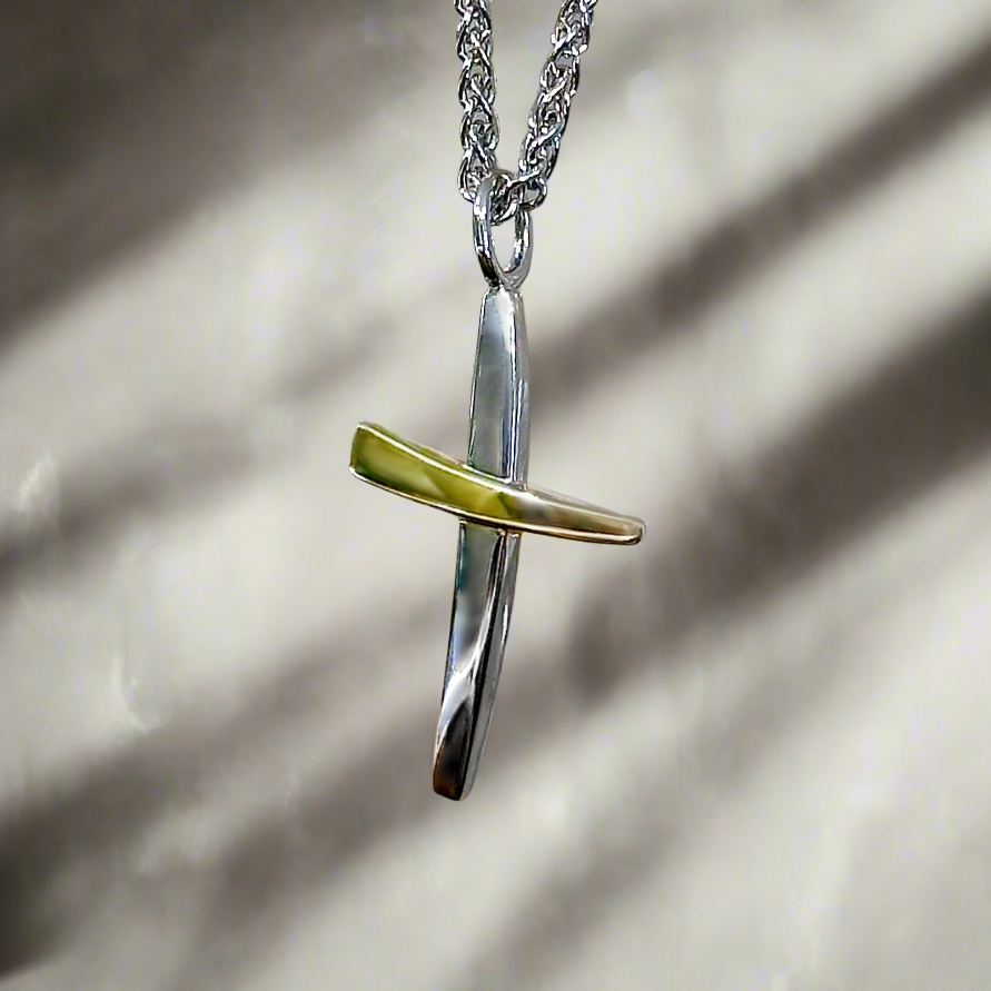 Photo of Two Toned Swept Cross in a decorative scene, designed by , available at Plumb Gold & Plumb Silver