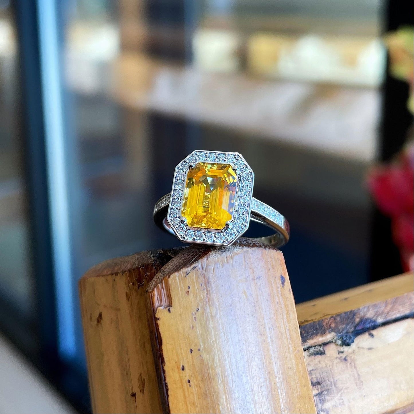 Photo of Yellow Sapphire Diamond Ring in a decorative scene, designed by , available at Plumb Gold & Plumb Silver