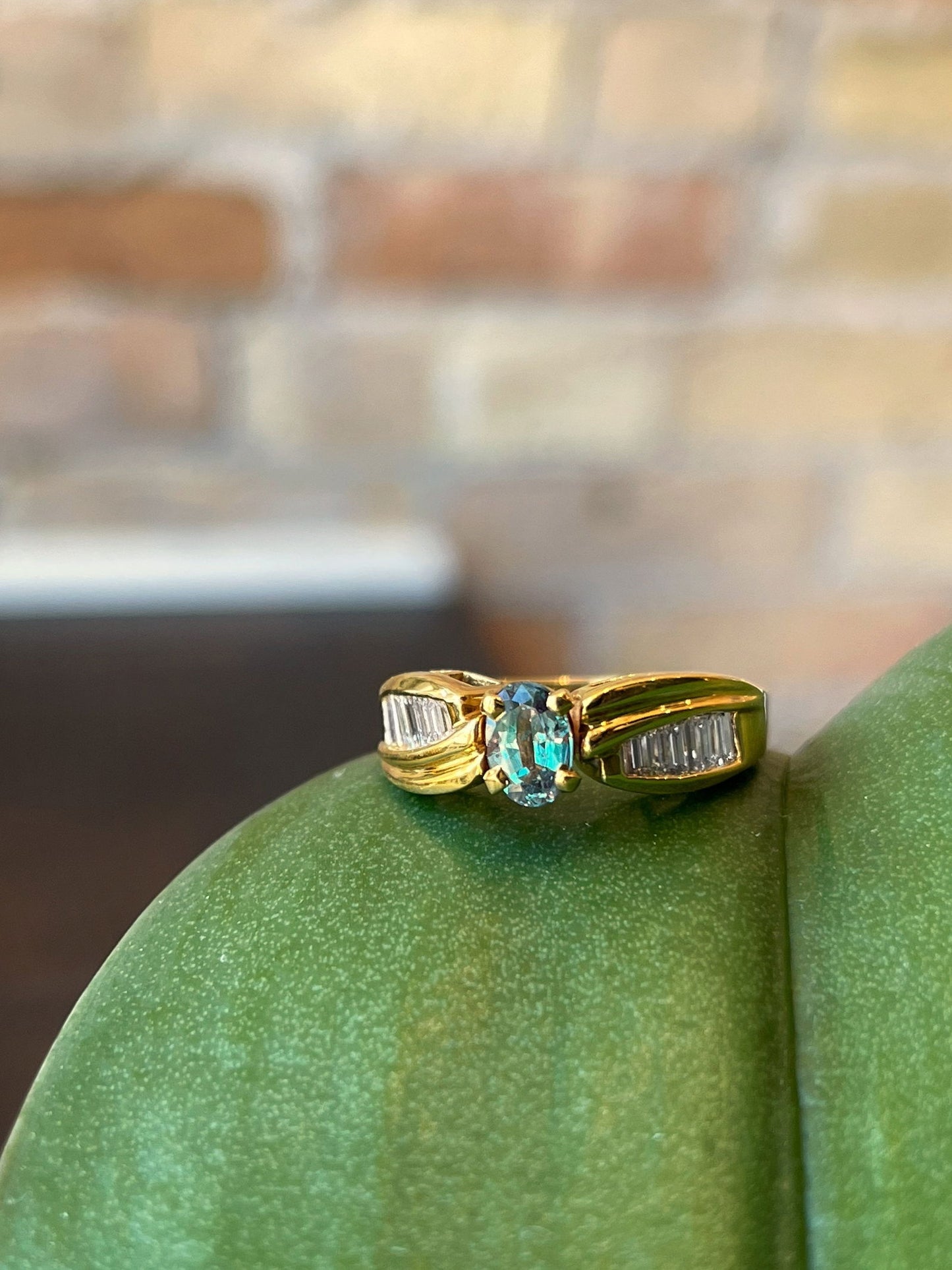 Photo of Zoma Color Alexandrite Ring in a decorative scene, designed by , available at Plumb Gold & Plumb Silver