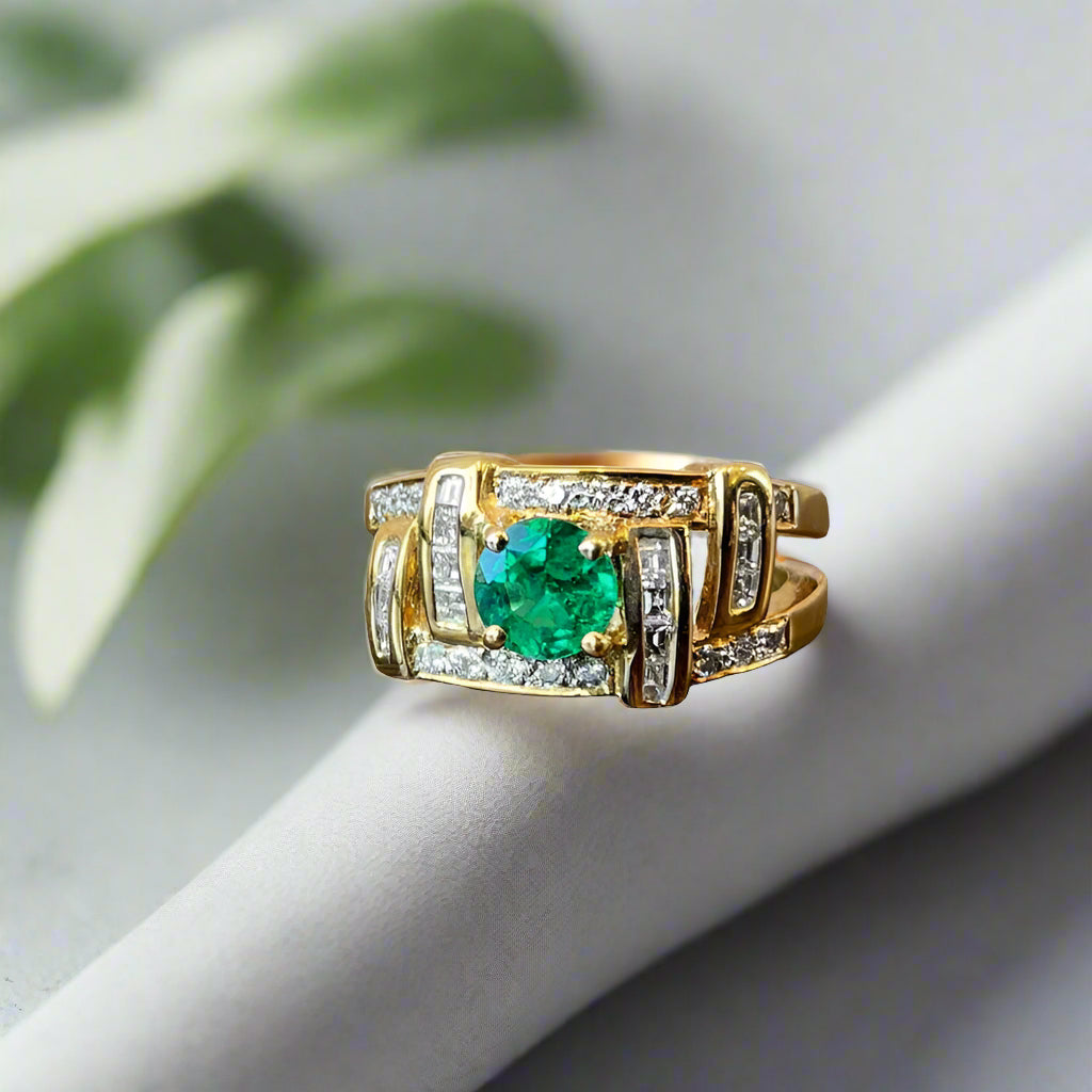 Photo of Zoma Color Emerald and Diamond Ring in a decorative scene, designed by , available at Plumb Gold & Plumb Silver
