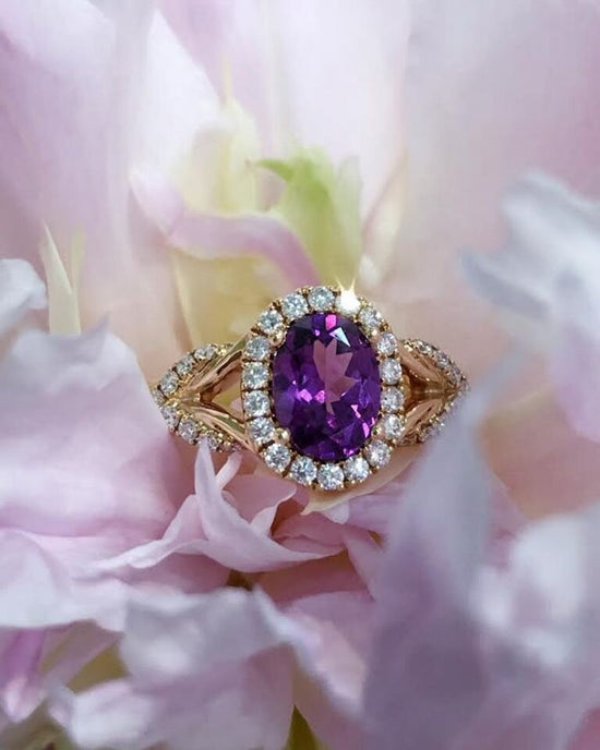Photo of Zoma Color Purple Garnet Ring in a decorative scene, designed by , available at Plumb Gold & Plumb Silver