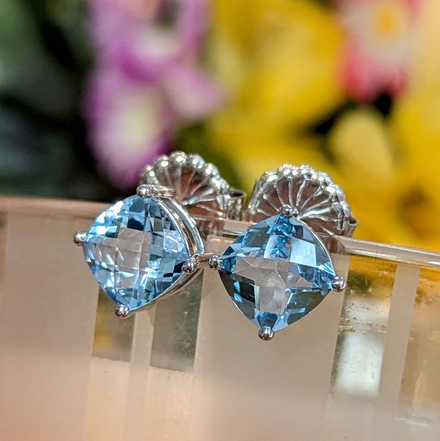 Photo of rose zircon studs in a decorative scene, designed by , available at Plumb Gold & Plumb Silver