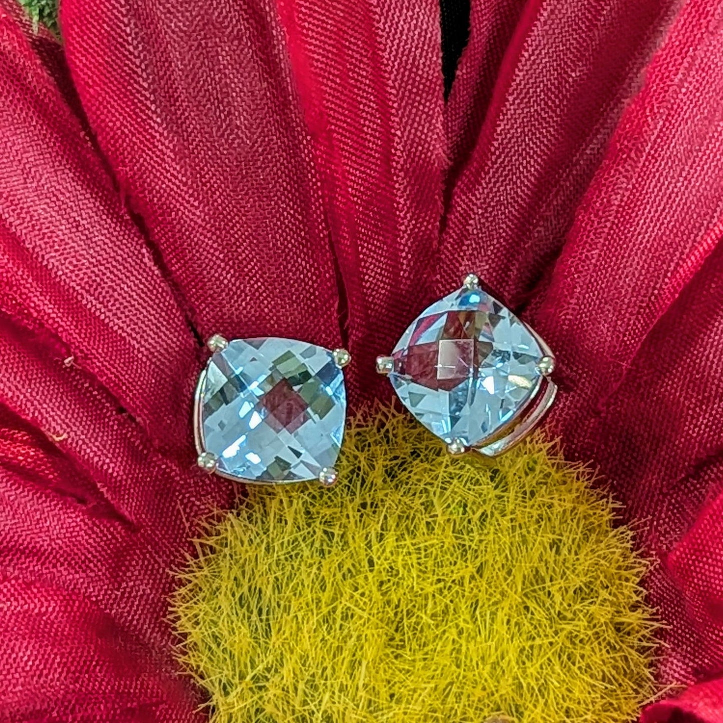 Photo of rose zircon studs in a decorative scene, designed by , available at Plumb Gold & Plumb Silver